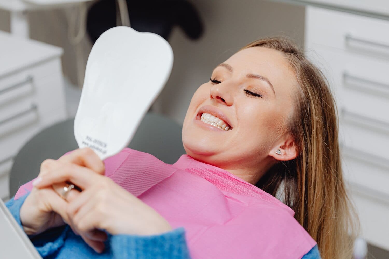 Completed Invisalign treatment smile reveal